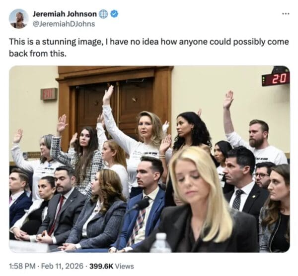 A reactions to Pam Bondi judicial hearing tweet showing a photo of the committee swearing in while Bondi looks down, captioned as a "stunning image."