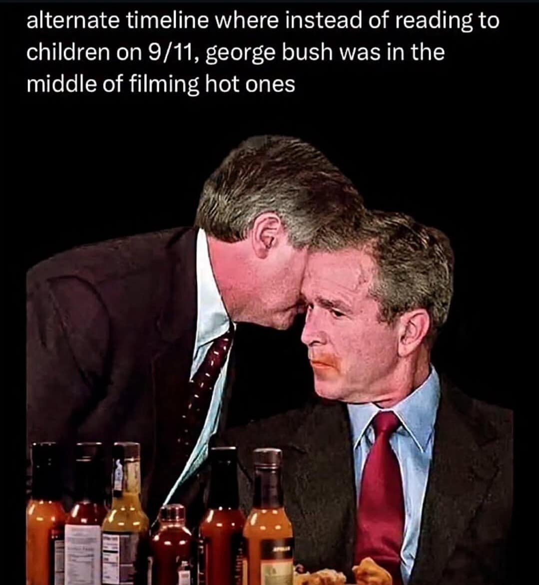 An "alternate timeline" classic meme showing a photoshopped image of George W. Bush sitting at the "Hot Ones" interview table with hot sauce on his lip, while an aide whispers in his ear during the taping.