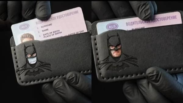 A funny cursed image of a Batman wallet where the owner's ID photo provides the lower half of Batman's face.