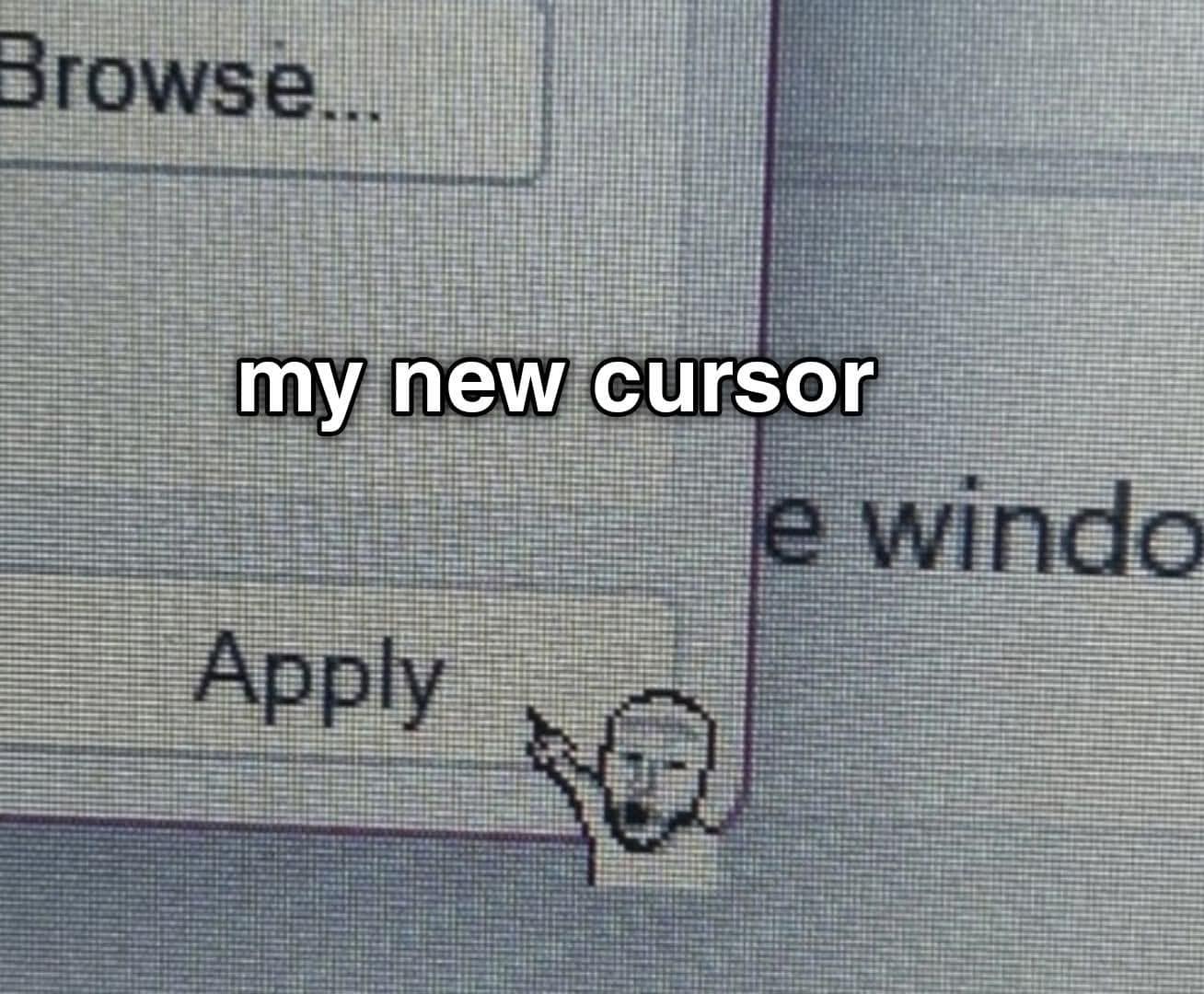 A hilarious meme of a computer screen where the standard mouse cursor has been replaced by a pixelated "Wojak pointing" meme. The little icon points excitedly at the "Apply" button in a settings window.