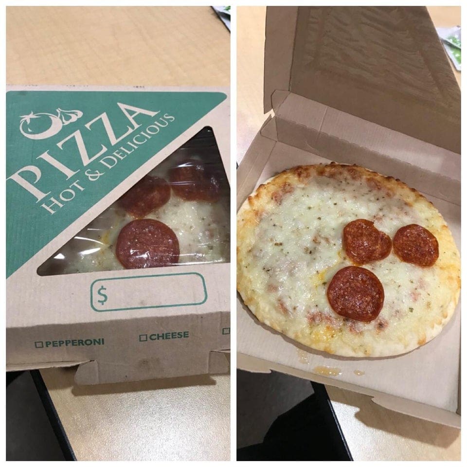 A pizza box window showing pepperoni slices positioned only where visible while the rest is plain cheese.