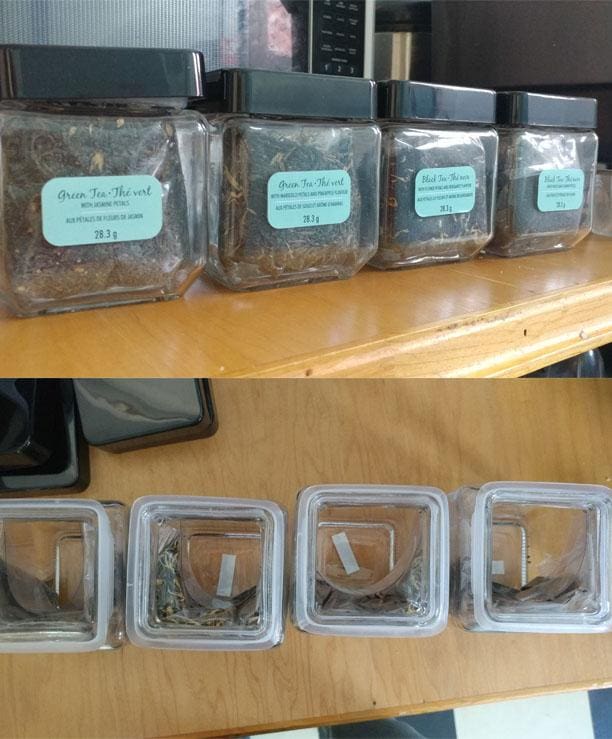 Glass jars of tea where the label covers the empty space leaving only a small amount of tea at the bottom