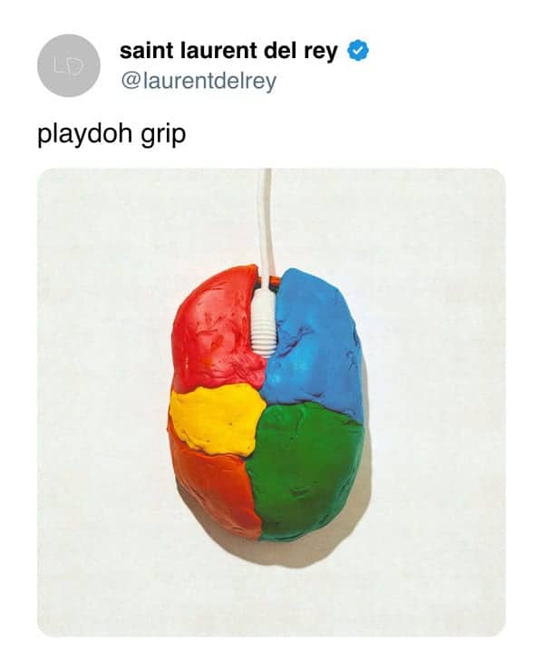 A computer mouse with a colorful, textured exterior made to look like molded Play-Doh.