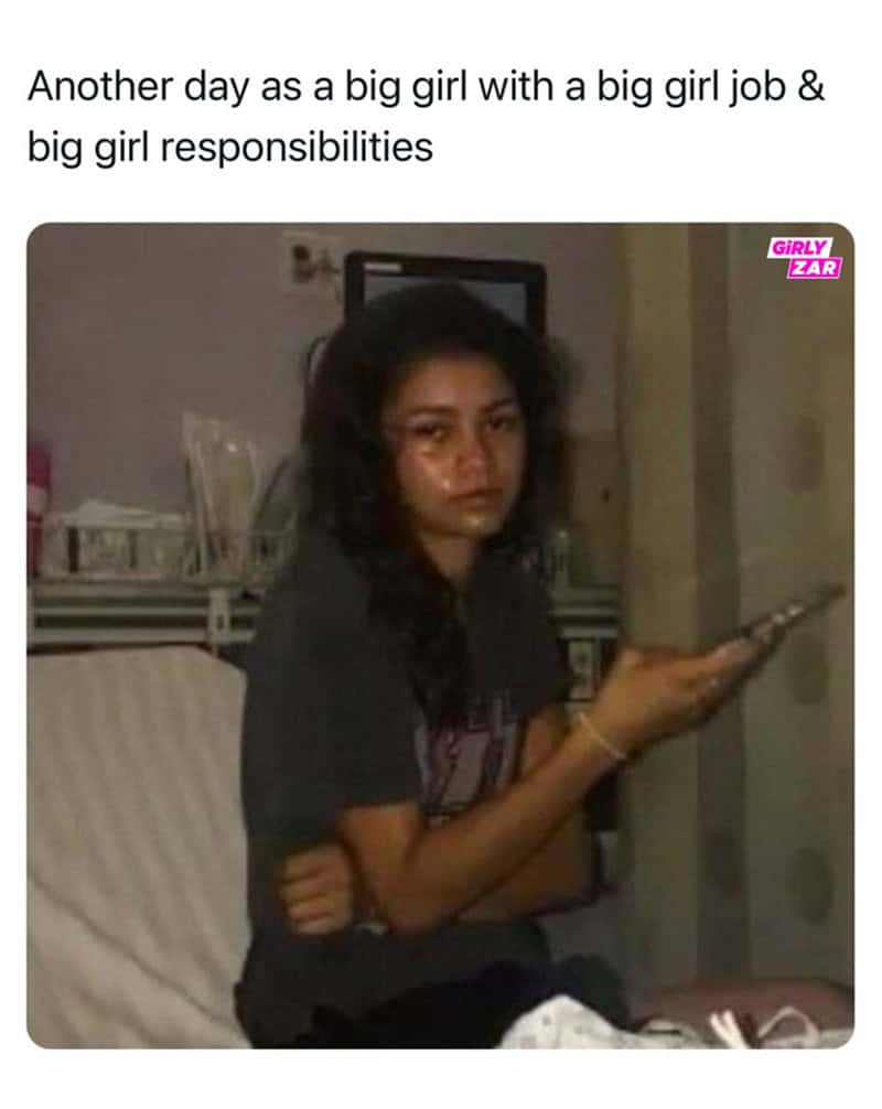 A relatable funny work meme showcasing a tired, low-quality image of Zendaya looking absolutely drained. It’s paired with the sarcastic text: "Another day as a big girl with a big girl job & big girl responsibilities."